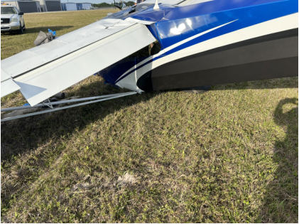 Photograph 4 – Main wreckage, left wing view, gear collapsed, from the NTSB investigation of C K Ing Adventure LLC CCX-2000 accident near Okeechobee, Florida, February 23, 2025