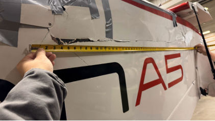 Photograph 2 – Right side fuselage accident damage, from the NTSB investigation of Icon A5 accident near Smithville, Tennessee, February 25, 2025