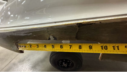 Photograph 3 – Right main landing gear pylon accident damage, from the NTSB investigation of Icon A5 accident near Smithville, Tennessee, February 25, 2025