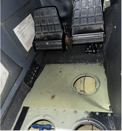 Photograph 9 – Forward Left Footwell, from the NTSB investigation of Cessna 172 accident near Brooksville, Florida, March 9, 2025