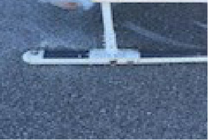 Photograph 3 – Right Side Fuselage Damage, from the NTSB investigation of Bell 206 accident near Chamblee, Georgia, March 21, 2025