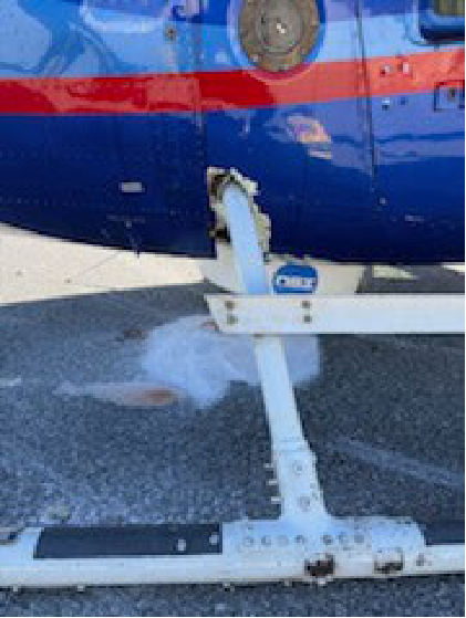 Photograph 4 – Closeup of Right Side Fuselage Damage, from the NTSB investigation of Bell 206 accident near Chamblee, Georgia, March 21, 2025