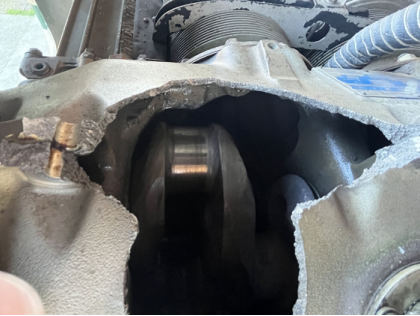 Photograph 2 – Hole in engine case, from the NTSB investigation of Beech E33 accident near Lenoir, North Carolina, February 25, 2025