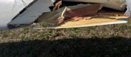 Photograph 5 – Damage to left wing, from the NTSB investigation of Schleicher ASW-19 accident near Zephyrhills, Florida, April 2, 2025
