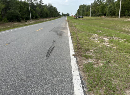 Photograph 1 – View of the accident site., from the NTSB investigation of Cessna 182A accident near Ocala, Florida, May 8, 2025