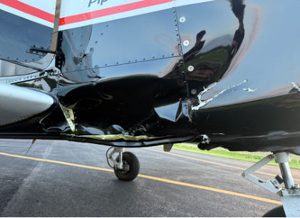 Photograph 1 – Deformation noted to primary structure of fuselage, from the NTSB investigation of Piper Aircraft INC PA-28-181 accident near Tiffin, Ohio, May 8, 2025