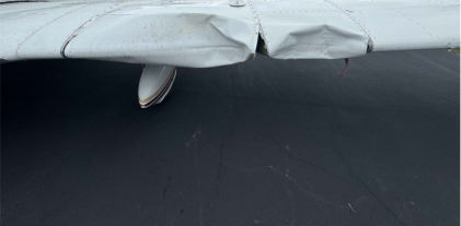 Photograph 1 – FAA Digital Photograph. Frontal View of a Portion of the Left Wing Showing the Leading Edge Impact Damage, from the NTSB investigation of Piper PA28 accident near Knoxville, Tennessee, June 8, 2025