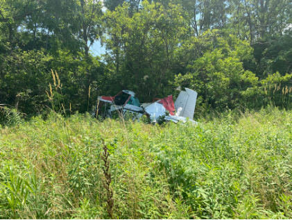 Photograph 1 – Fragmented fuselage, from the NTSB investigation of Cessna T188C accident near Mount Gilead, Ohio, June 26, 2025