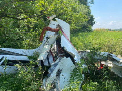 Photograph 2 – Impact separated left wing, from the NTSB investigation of Cessna T188C accident near Mount Gilead, Ohio, June 26, 2025