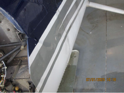 Photograph 5 – Close up of damage to left side of fuselage, from the NTSB investigation of Cessna 177B accident near Calera, Alabama, June 24, 2025