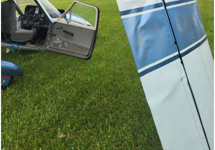 Photograph 1 – View of right wing damage., from the NTSB investigation of Cessna 177 accident near Kelleys Island, Ohio, June 27, 2025