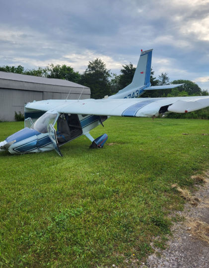 Photograph 3 – View of left wing, right wing, and fuselage damage., from the NTSB investigation of Cessna 177 accident near Kelleys Island, Ohio, June 27, 2025
