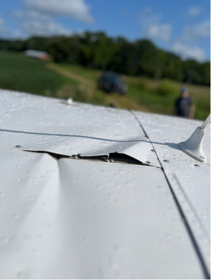 Photograph 2 – Left upper wing root view, from the NTSB investigation of Cessna 150 accident near Fordsville, Kentucky, August 13, 2025
