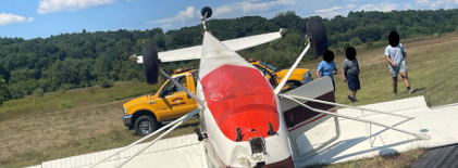 Photograph 2 – Deformation noted to fuselage skin and right-wing lift strut, from the NTSB investigation of Cessna 170 accident near Fitchburg, Massachusetts, August 23, 2025