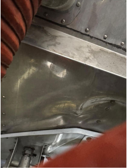 Photograph 1 – Firewall Damage, from the NTSB investigation of Cessna 172 accident near Spring Hill, Florida, August 22, 2025