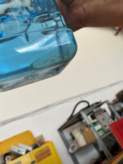 Photograph 4 – View of fuel sample taken 2 days prior to the accident., from the NTSB investigation of Cessna 172 accident near New Smyrna Beach, Florida, August 29, 2025