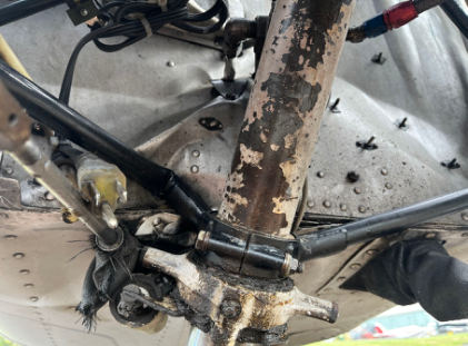 Photograph 2 – Damaged engine mount and collapsed nose wheel strut, from the NTSB investigation of Cessna 152 accident near Pottstown, Pennsylvania, August 8, 2025