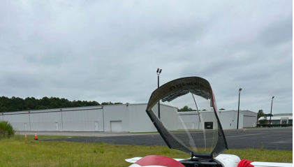 Photograph 1 – View of damage right wing., from the NTSB investigation of Amateur-built ERACER MK II accident near Mount Pleasant, South Carolina, September 5, 2025