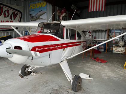 Photograph 1 – Left Side of Main Wreckage, from the NTSB investigation of Piper PA22 accident near Merritt Island, Florida, September 20, 2025