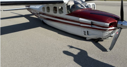 Photograph 1 – Gear up landing, from the NTSB investigation of Cessna P210 accident near Akron, Ohio, September 9, 2025