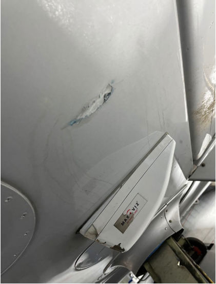 Photograph 3 – Left Fuel Cell Breach, from the NTSB investigation of Cirrus Design CORP SR22 accident near West Milford, New Jersey, September 28, 2025