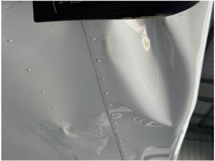 Photograph 4 – View of right-hand wing showing leading edge and spar damage, from the NTSB investigation of Cessna T182T accident near Venice, Florida, October 4, 2025