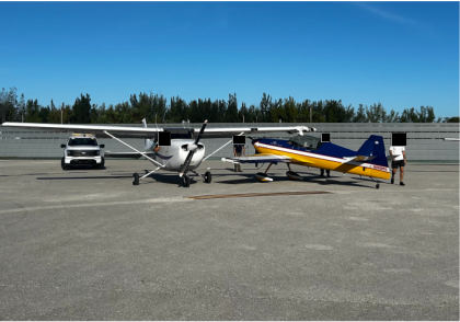 Photograph 1 – Ground Collision Between N825KS (High-Wing) and N202RD (Low-Wing), from the NTSB investigation of Akrotech Aviation INC GILES G-202 and Cessna 172R accident near Boca Raton, Florida, October 28, 2025