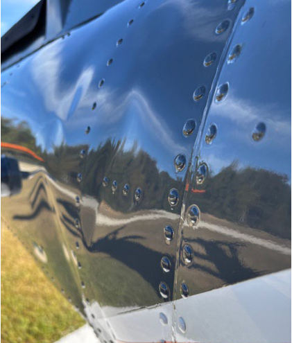 Photograph 3 – Damage to Right side of Tail boom, from the NTSB investigation of Eurocopter AS350 accident near Wetumpka, Alabama, October 23, 2025