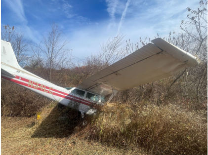 Photograph 2 – Outboard Right Wing Leading Edge Damage with Brush, from the NTSB investigation of Cessna 172 accident near Oxford, Connecticut, November 6, 2025