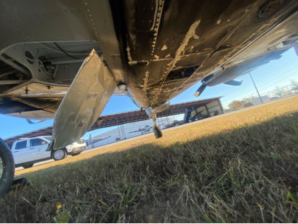 Photograph 3 – Abrasion Damage to Fuselage, from the NTSB investigation of Beech 95-B55 accident near Dothan, Alabama, November 14, 2025