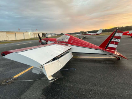 Photograph 1 – Left Side View showing damage to wing and aileron, from the NTSB investigation of Amateur-built MAX TH accident near Inverness Highlands South, Florida, November 26, 2025