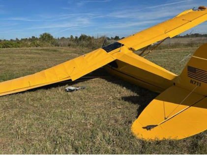 Photograph 4 – Left-hand rear view showing damage to wings, from the NTSB investigation of Cub Crafters Carbon Cub FX2 accident near Okeechobee, Florida, November 28, 2025