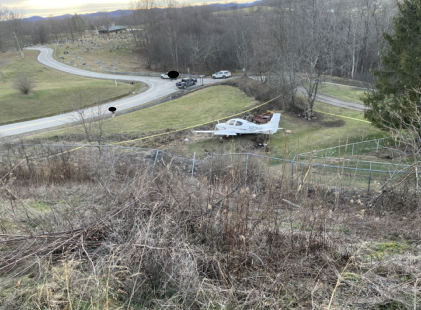 Photograph 1 – Overview of the airplane at the accident site., from the NTSB investigation of Cirrus Design CORP SR22 accident near Philippi, West Virginia, January 8, 2026