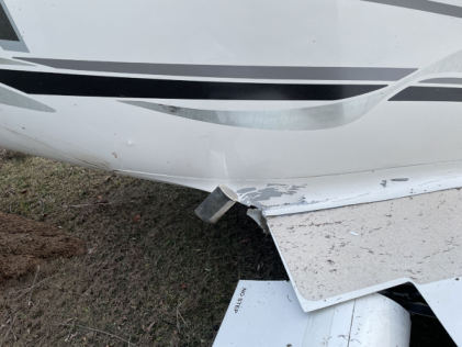 Photograph 3 – View of damage to the right wing root., from the NTSB investigation of Cirrus Design CORP SR22 accident near Philippi, West Virginia, January 8, 2026