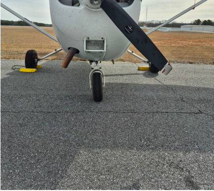 Photograph 1 – Frontal View of the Airplane on the Ramp Note the damaged lower Propeller Blade, from the NTSB investigation of Cessna 172 accident near Atlanta, Georgia, January 28, 2026
