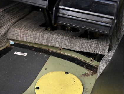 Photograph 5 – Close-Up View Showing Buckling Damage to Pilot’s Side Floor, from the NTSB investigation of Cessna 172 accident near Atlanta, Georgia, January 28, 2026