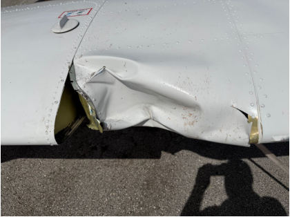 Photograph 1 – View of left wing damage caused by bird strike., from the NTSB investigation of Piper PA-28-181 accident near Chuluota, Florida, March 6, 2026