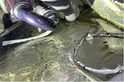 Photograph 3 – Oil Line Attached With Clamp at Oil Pump Fitting, from the NTSB investigation of Icon A5 accident near Levittown, Puerto Rico, April 15, 2026