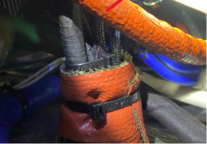 Photograph 5 – Close-up of Oil Cooler Fitting, from the NTSB investigation of Icon A5 accident near Levittown, Puerto Rico, April 15, 2026