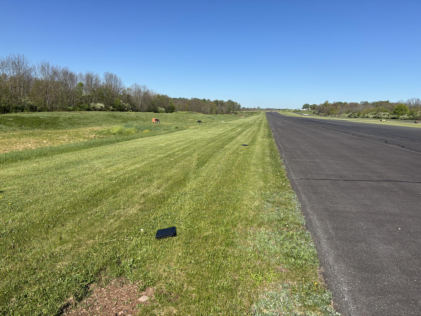 Photograph 1 – View of tire marks approaching the PAPI lights., from the NTSB investigation of Cessna 172 accident near Quakertown, Pennsylvania, April 24, 2026
