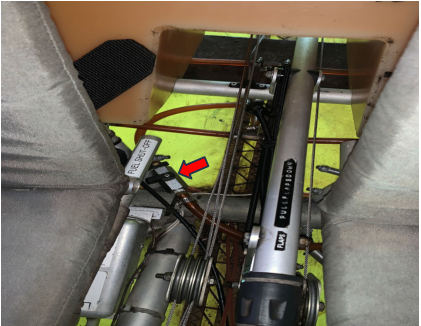 Photograph 3 – View of fuel selector behind seat in the off position. Shown with a red arrow pointing to it., from the NTSB investigation of Sky Ranger SKY RANGER 1 accident near Front Royal, Virginia, May 9, 2026