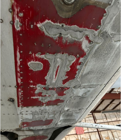 Photograph 1 – Damage to lower fuselage, from the NTSB investigation of Cessna 177RG accident near Statesville, North Carolina, May 18, 2026