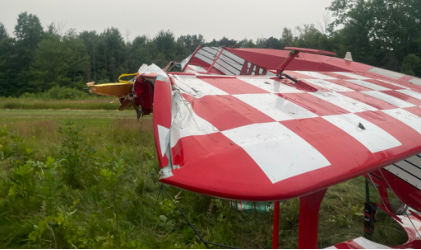 Photograph 5 – Damage to Left Lower Wing, from the NTSB investigation of Christen Industries INC PITTS S-2 accident near Porter Center, New York, July 17, 2026