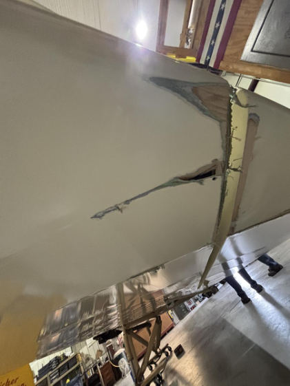 Photograph 2 – View of damage to the lower left wing and aileron., from the NTSB investigation of Waco ASO accident near Hamilton, Ohio, July 24, 2026