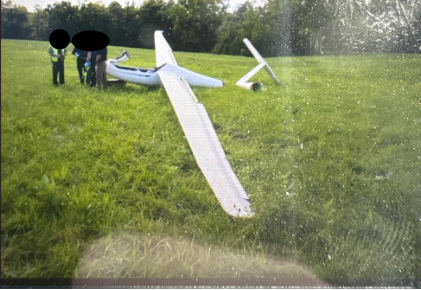 Photograph 1 – View of the glider at the accident site., from the NTSB investigation of Hph LTD GLASFLUGEL 304CZ accident near Xenia, Ohio, August 21, 2026