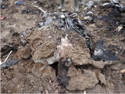 Photograph 5 – View of engine at accident site, from the NTSB investigation of Piper PA-32-260 accident near Madras, Oregon, March 10, 2024