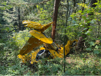 Photograph 1 – Main wreckage at accident site., from the NTSB investigation of Boeing A75L3 accident near Yacolt, Washington, September 6, 2024