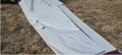 Photograph 5 – Accident site, view of the right wing., from the NTSB investigation of Cessna 172N accident near Casper, Wyoming, February 26, 2024