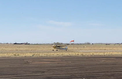 Photograph 1 – Airplane Takeoff with Windsock, from the NTSB investigation of Cessna 195B accident near Portales, New Mexico, April 8, 2024