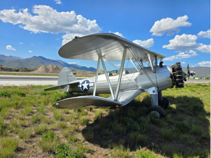 Photo 1 – View of right-wing damage., from the NTSB investigation of Boeing-Stearman PT-17 accident near Heber City, Utah, May 27, 2024